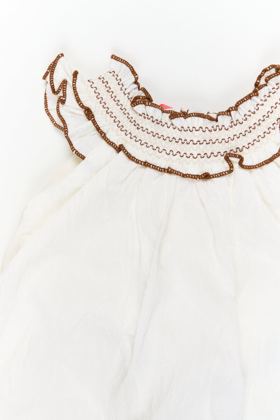 The Nesavu Girls Chanderi Frock Girls Embroidered Frock for Naming Ceremony and Milestone Events Nesavu Nesavu half-white embroidered frock in viscose blend for naming ceremony and traditional functions