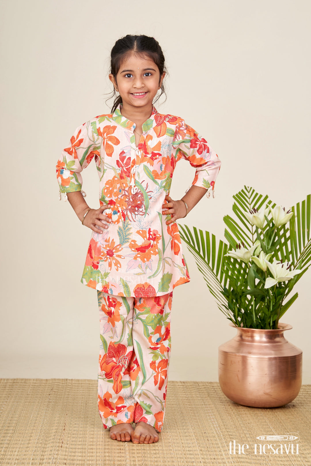 The Nesavu Girls Sharara / Plazo Set Girls ethnic sharara set with bright floral prints for festive comfort Nesavu Nesavu girls cotton floral sharara kurta set  festive ethnic wear summer