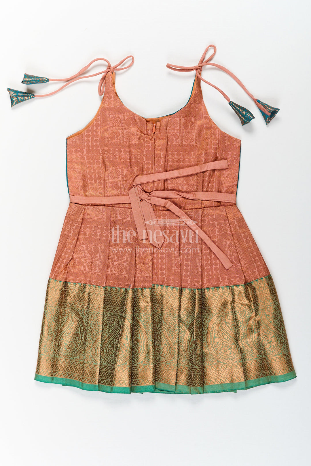 The Nesavu Tie-up Frock Girls Ethnic Silk Dresses in Semi Kanchivaram with Tie Up Sleeves and Zari Woven Orange Green Pleated Skirt Nesavu Ethnic Silk Dresses for Girls in Semi Kanchivaram with Orange Green Zari Pleated Tie Up Frock | The Nesavu