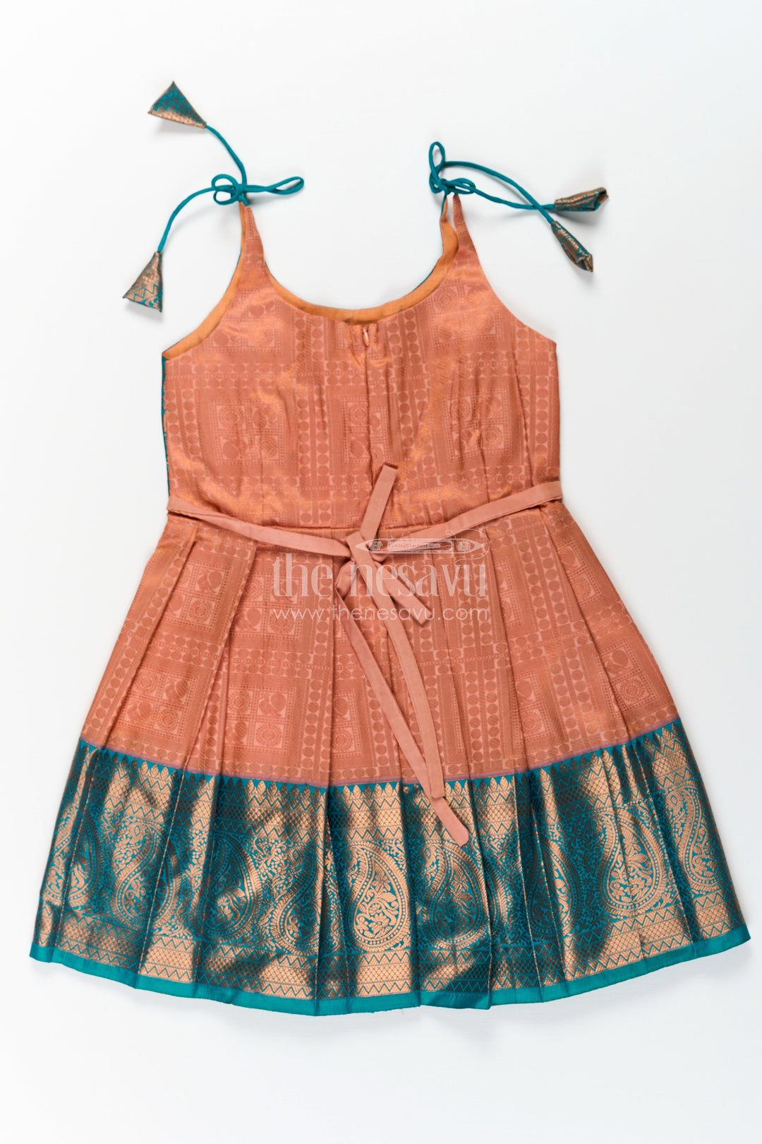The Nesavu Tie-up Frock Girls Ethnic Silk Dresses in Semi Kanchivaram with Tie Up Sleeves and Zari Woven Orange Green Pleated Skirt Nesavu Ethnic Silk Dresses for Girls in Semi Kanchivaram with Orange Green Zari Pleated Tie Up Frock | The Nesavu