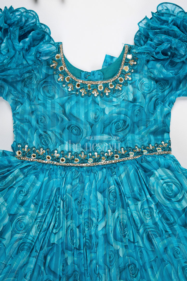 The Nesavu Silk Party Frock Girls Fancy Frock in Blue Organza Printed Fabric with Puff Sleeves and Floral Embellishments Nesavu Nesavu Girls Fancy Frock Teal Blue Puff Sleeves Floral Embellishments Organza