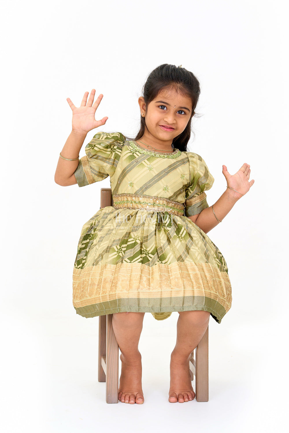 The Nesavu Silk Party Frock Girls Fancy Frock in Green Tissue Silk with Floral Embellishments and Short Pleated Skirt Nesavu Nesavu Girls Fancy Frock Green Tissue Silk Gold Floral Embellishments Pleated Skirt