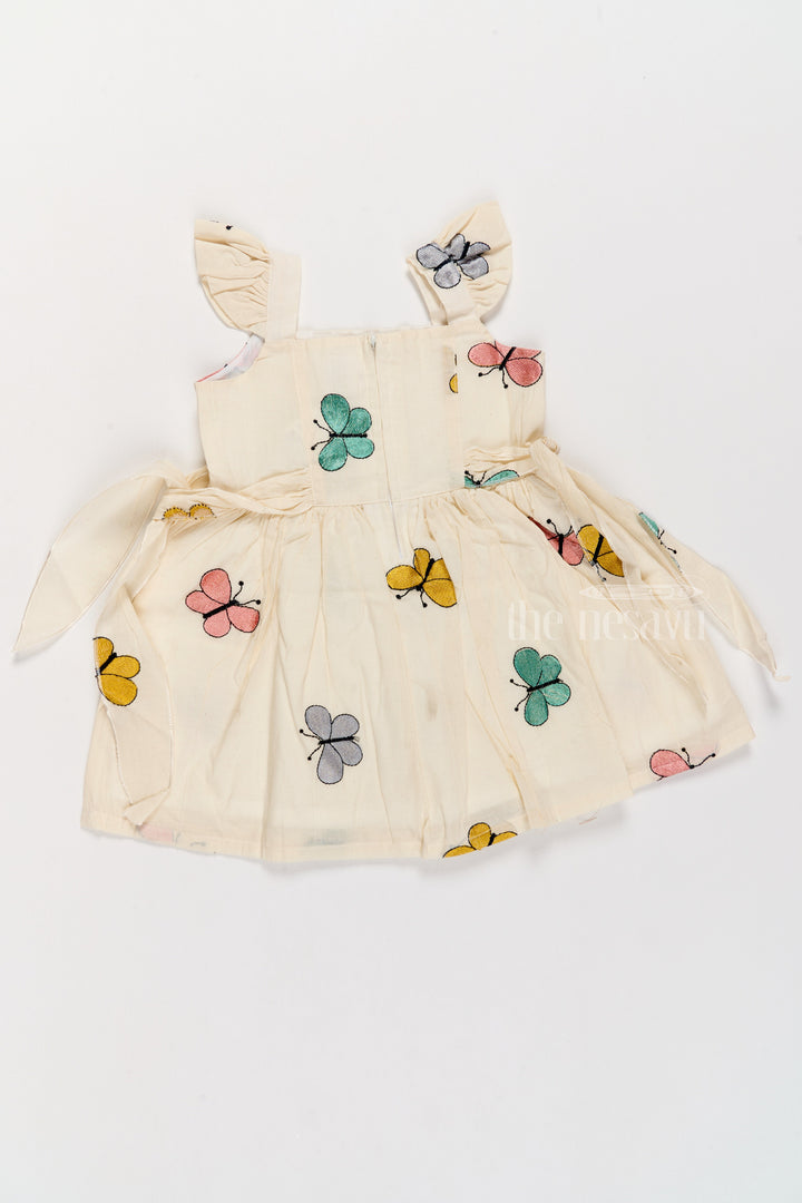 The Nesavu Girls Cotton Frock Girls Fancy Frock with Butterfly Embroidery and Ruffled Sleeves Nesavu Girls Fancy Frock Butterfly Embroidery Ruffled Sleeves Side Bow | The Nesavu