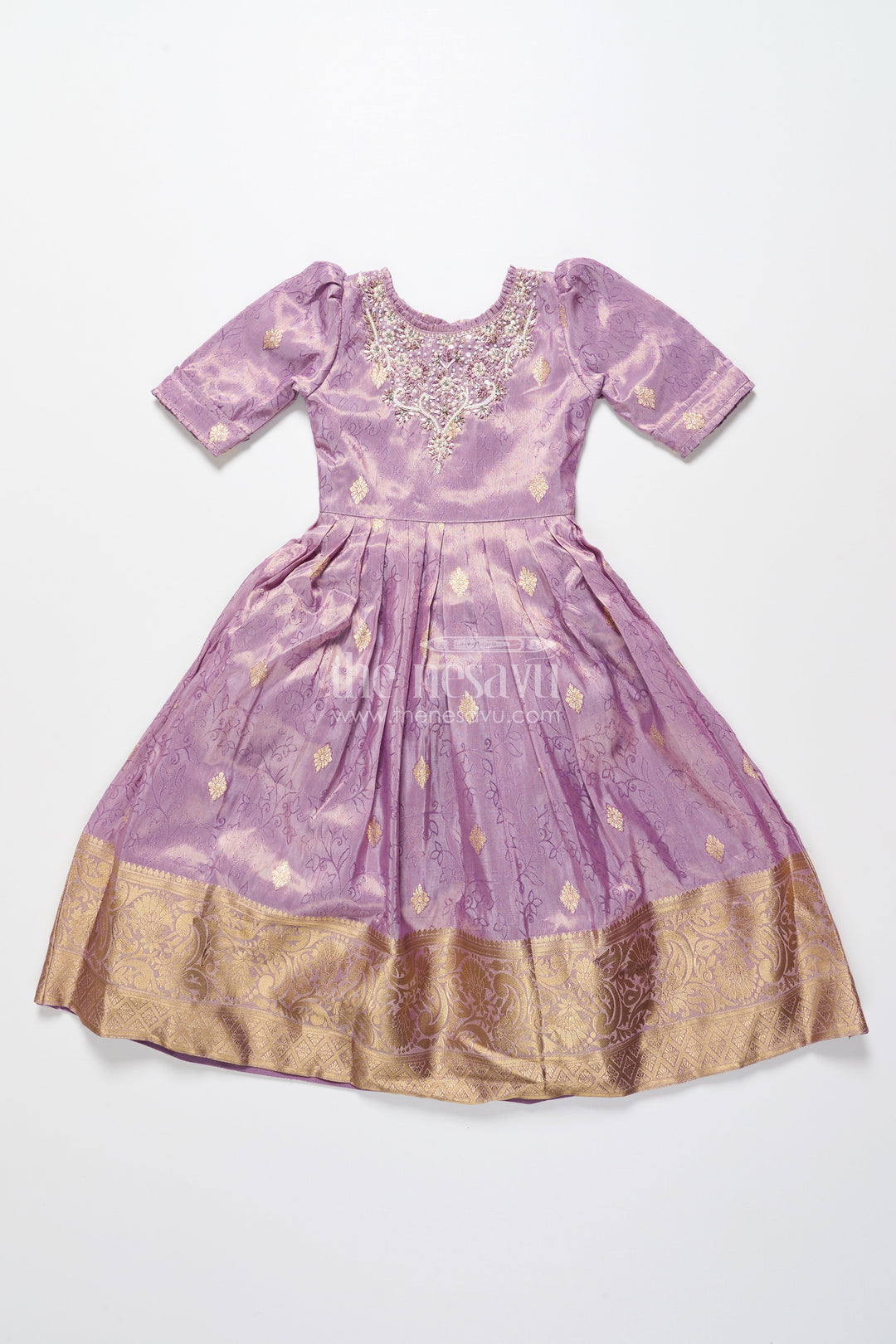 The Nesavu Girls Silk Gown Girls Festive Silk Gown with Zari Border for Grand Celebrations Nesavu Nesavu girls festive silk gown traditional zari border weddings cultural functions