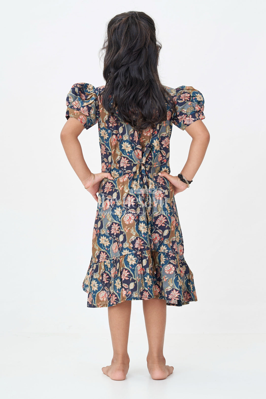 The Nesavu Girls Fancy Frock Girls Floral Frock Pattern Top in Blue Modal Silk with Ruffle Hem and Puff Sleeves for All-Day Style Nesavu Nesavu Girls Blue Floral Modal Silk Frock Pattern Top Puff Sleeves Ruffle Hemline