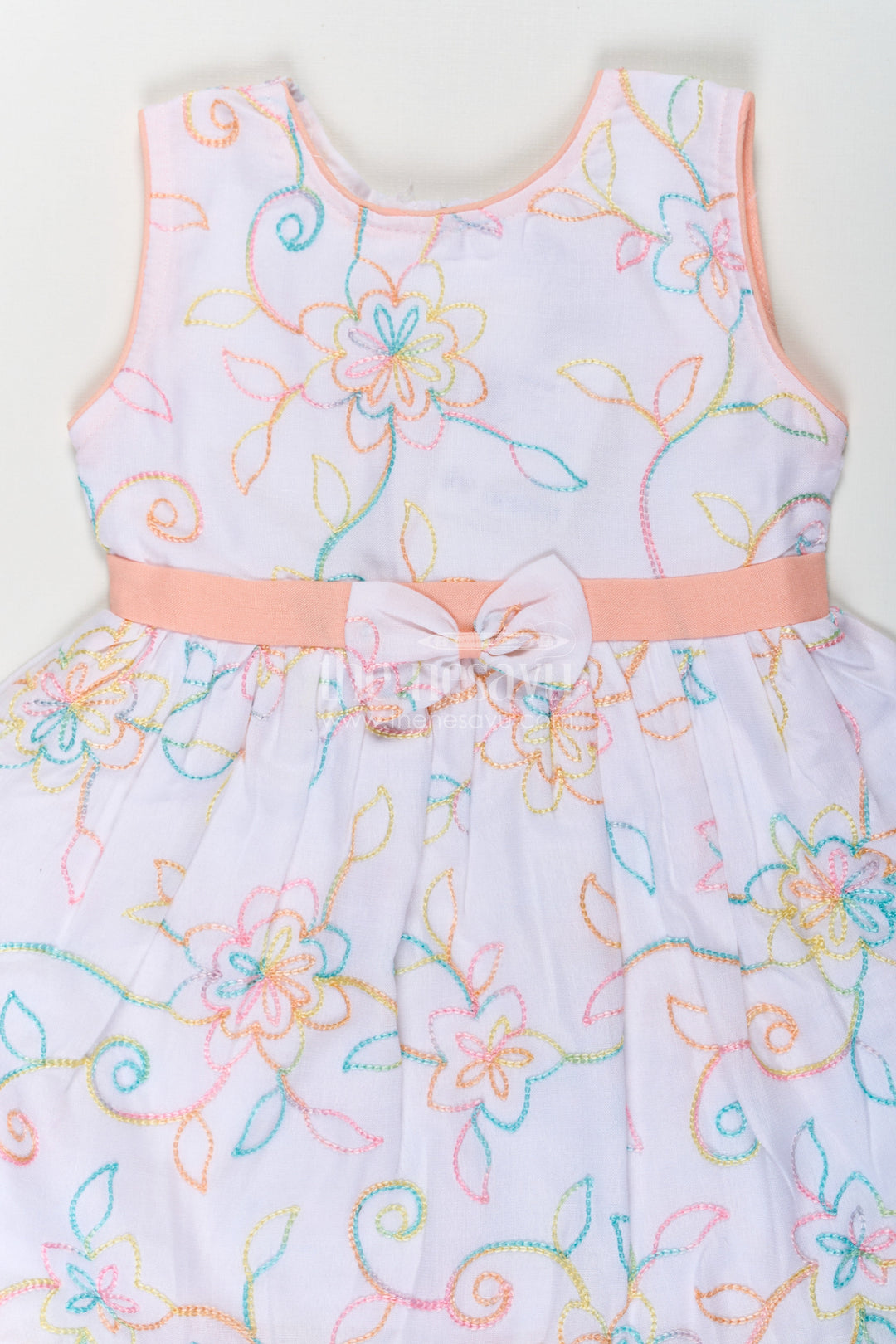 The Nesavu Baby Cotton Frocks Girls Flower White Dress in Cotton with Multicolor Floral Embroidery and Peach Waist Bow Nesavu Flower White Dress Girls Embroidered Cotton Multicolor Floral Patterns Bow Accent | The Nesavu
