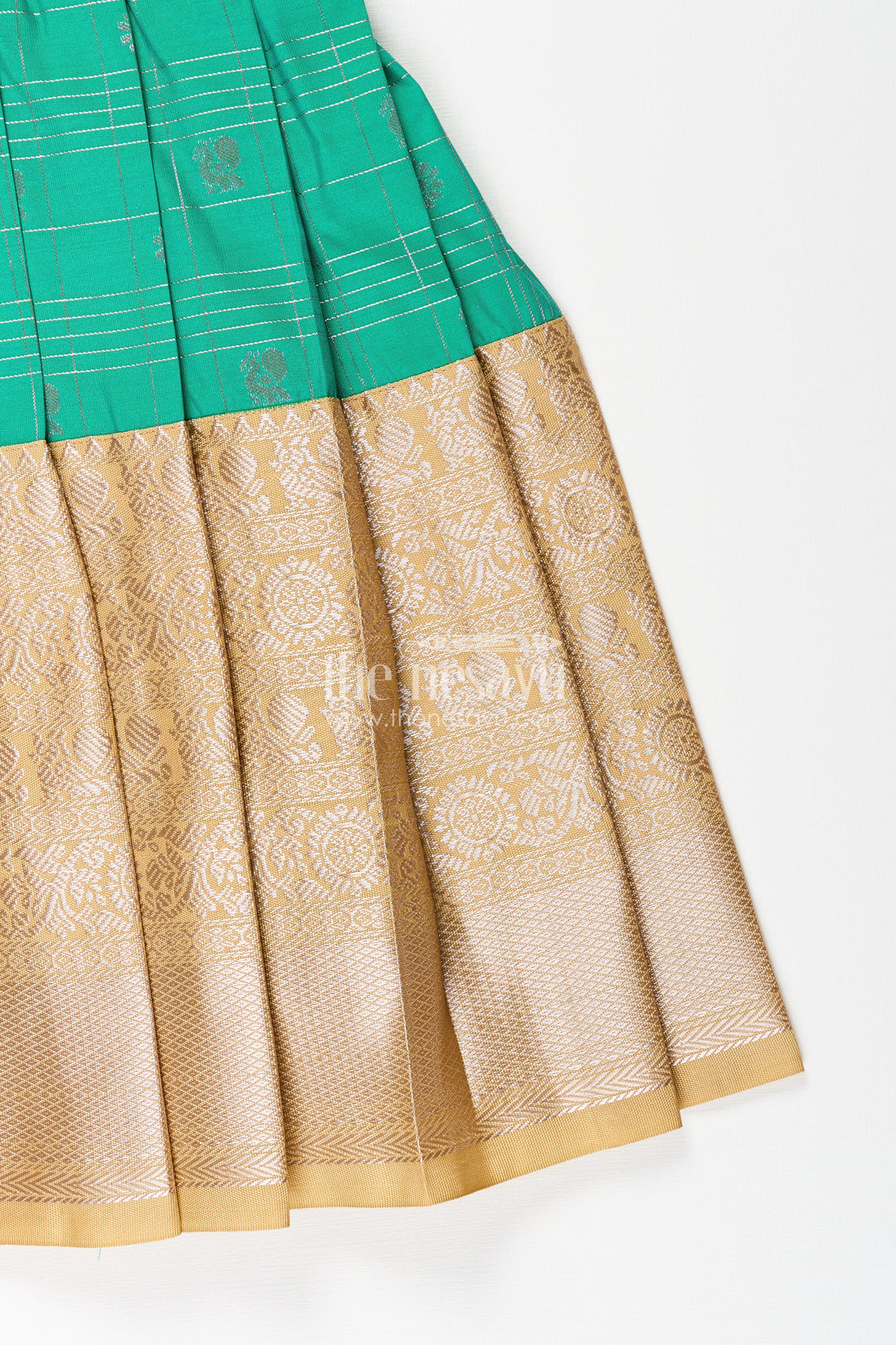 The Nesavu Girls Kanchi Silk Frock Girls Frocks Designs in Green Semi Kanchivaram Silk with Thread Embroidery and Lace Dupatta Nesavu Nesavu Girls Green Frocks Designs in Semi Kanchivaram Silk with Embroidery and Lace Dupatta