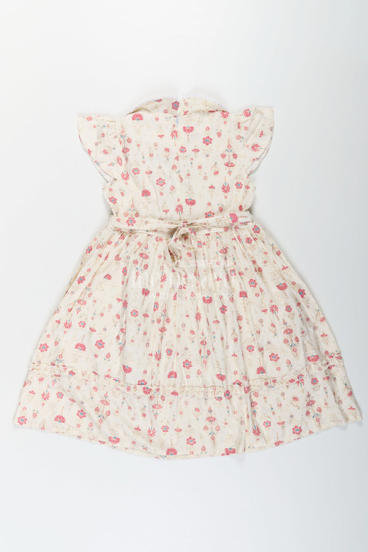 The Nesavu Girls Cotton Frock Girls Full Frock in Cream Rayon with Floral Digital Print and Ruffled Sleeves for Comfortable Wear Nesavu Girls Full Frock Cream Rayon Floral Digital Print Flutter Sleeves | The Nesavu
