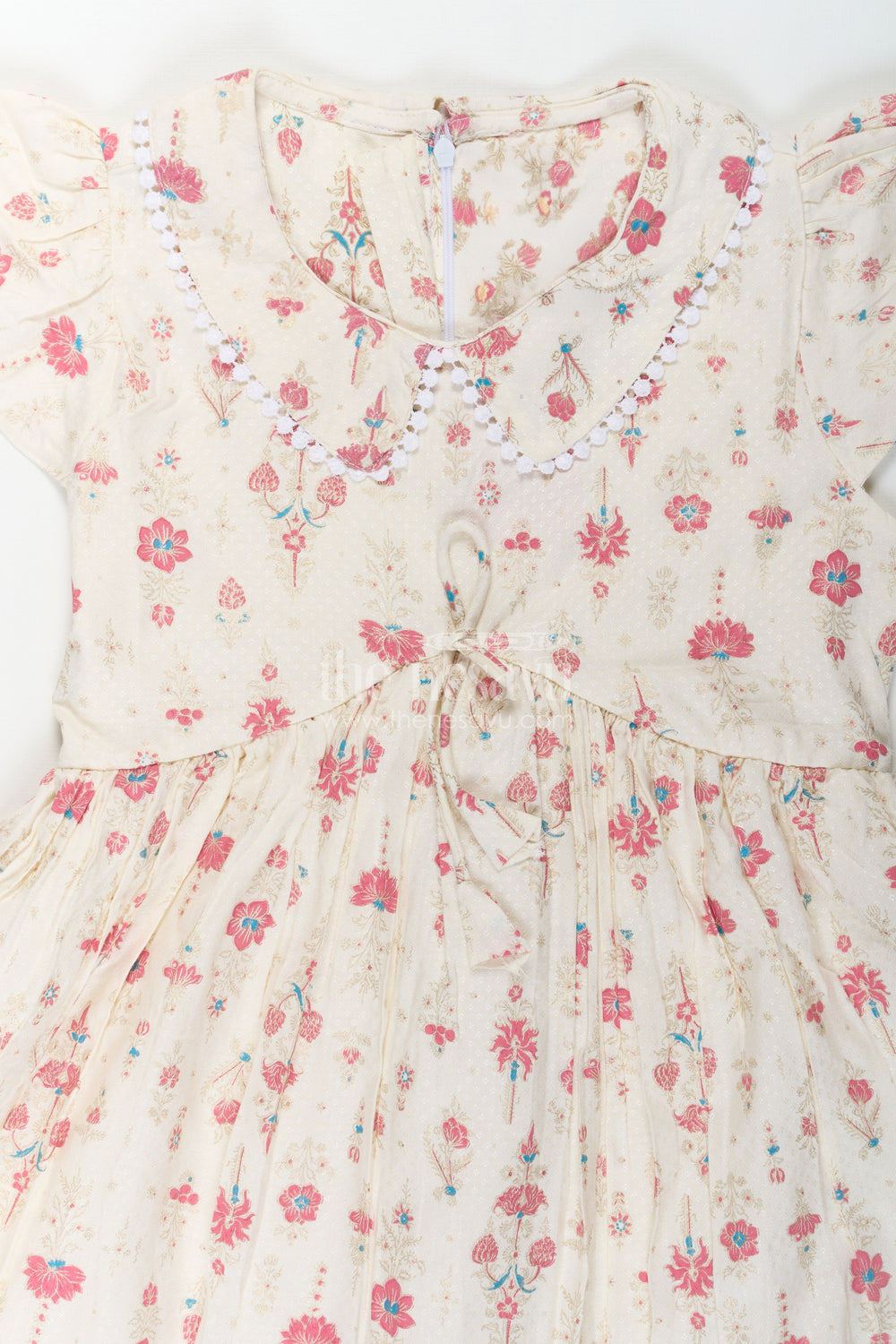 The Nesavu Girls Cotton Frock Girls Full Frock in Cream Rayon with Floral Digital Print and Ruffled Sleeves for Comfortable Wear Nesavu Nesavu Girls Full Frock Cream Rayon Floral Digital Print Flutter Sleeves