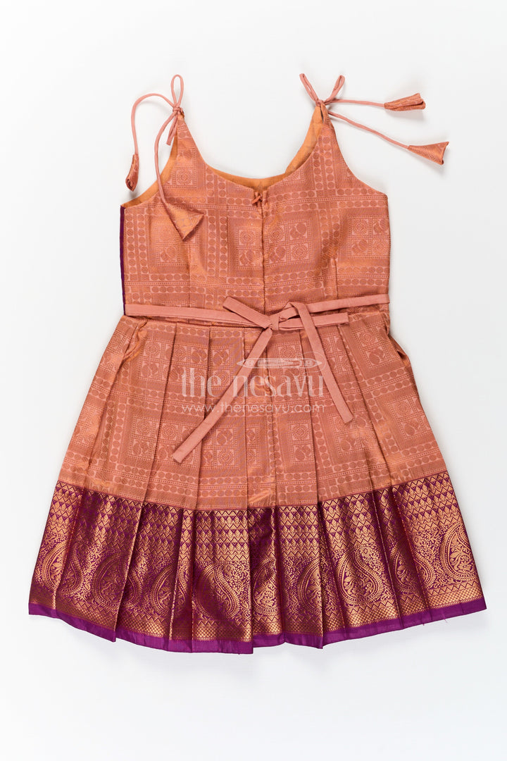 The Nesavu Tie-up Frock Girls Gold Silk Dress in Semi Kanchivaram with Purple Zari Bodice and Pleated Tie Up Tassel Frock Nesavu Gold Silk Dress for Girls in Semi Kanchivaram with Purple Zari Weave and Tassel Tie Up Straps | The Nesavu