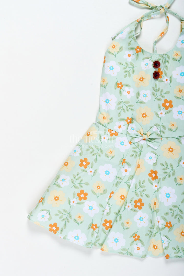 The Nesavu Girls Cotton Frock Girls Green Cotton Frock with Halter Neck and Floral Print for Summer Events Nesavu Nesavu Green Halter Neck Frock Toddler Girls Cotton Floral Dress Summer Events