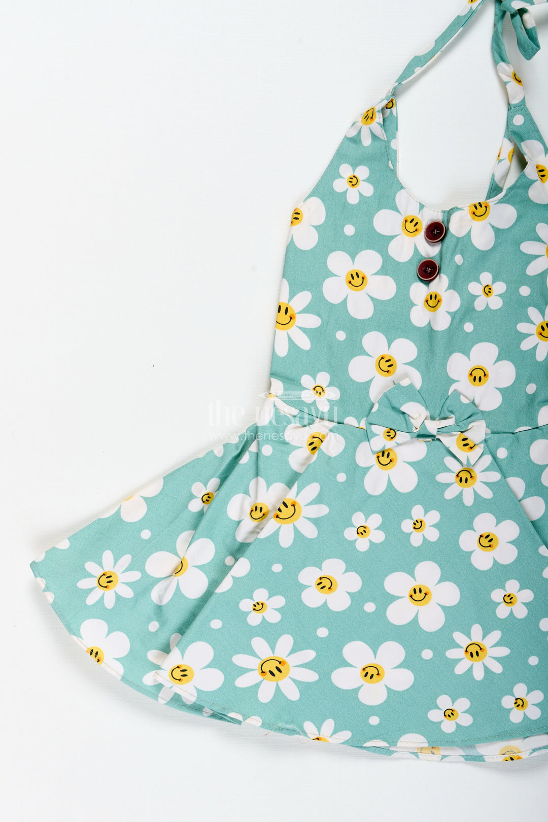 The Nesavu Girls Cotton Frock Girls Green Floral Frock with Smiley Print for Cheerful Summer Twirls Nesavu Nesavu Green Cotton Frock Smiley Floral Print Twirl-Worthy Dress Toddler Girls