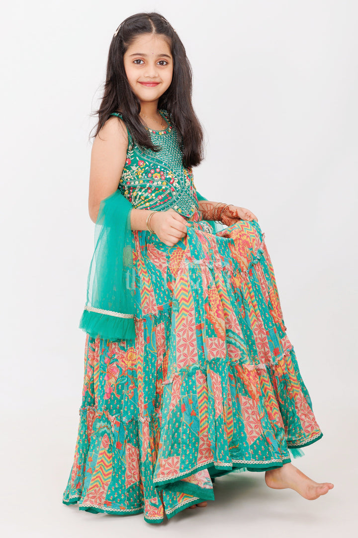 The Nesavu Girls Lehenga Choli Girls Green Pure Georgette Tiered Lehenga Choli with Mirror Detailing and Zigzag Print Nesavu Nesavu Girls Green Georgette Tiered Lehenga Choli Mirror Work Vibrant Zigzag Floral Patterns