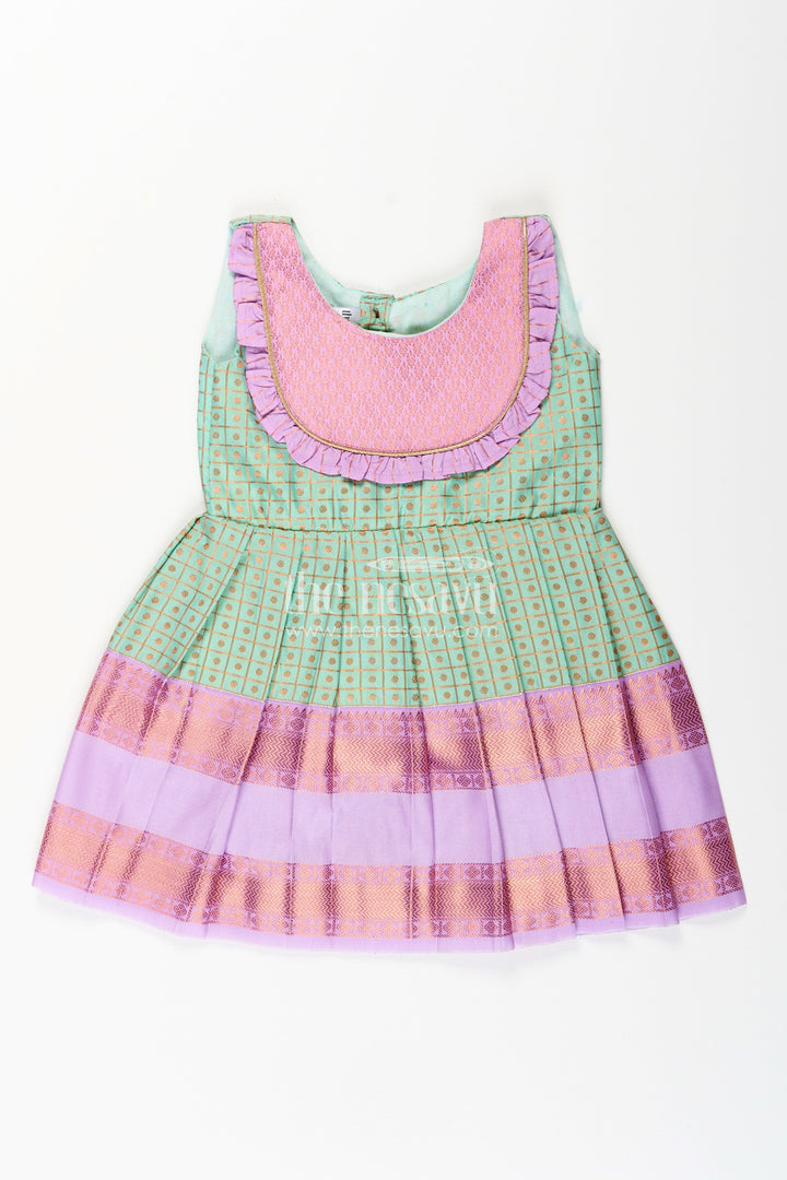 The Nesavu Girls Kanchi Silk Frock Girls green semi Kanchivaram silk frock with lavender border Nesavu 14 (6M) / Green / Style 1 SF1001DA-14 Nesavu girls green semi Kanchivaram silk frock with lavender border and frill yoke