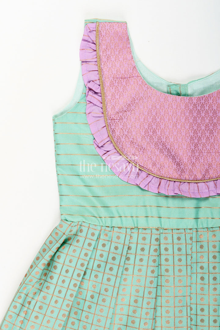 The Nesavu Girls Kanchi Silk Frock Girls Green Semi Kanchivaram Silk Frock with Lavender Border Nesavu Nesavu girls green semi Kanchivaram silk frock with lavender border and frill yoke