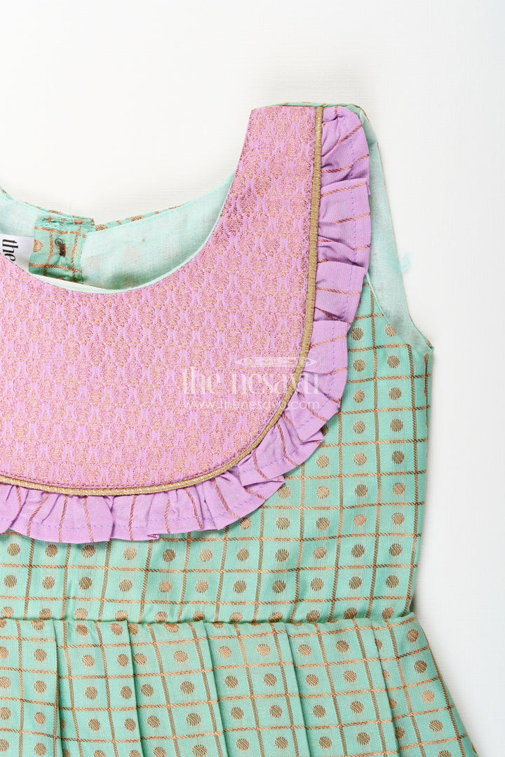 The Nesavu Girls Kanchi Silk Frock Girls Green Semi Kanchivaram Silk Frock with Lavender Border Nesavu Nesavu girls green semi Kanchivaram silk frock with lavender border and frill yoke