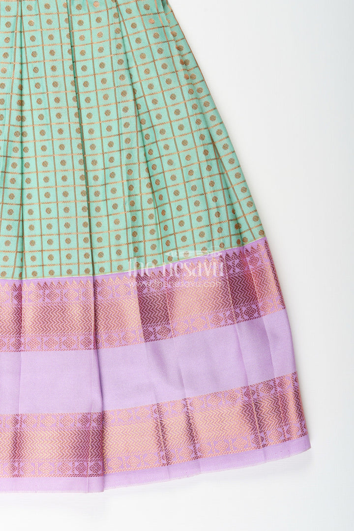 The Nesavu Girls Kanchi Silk Frock Girls Green Semi Kanchivaram Silk Frock with Lavender Border Nesavu Nesavu girls green semi Kanchivaram silk frock with lavender border and frill yoke