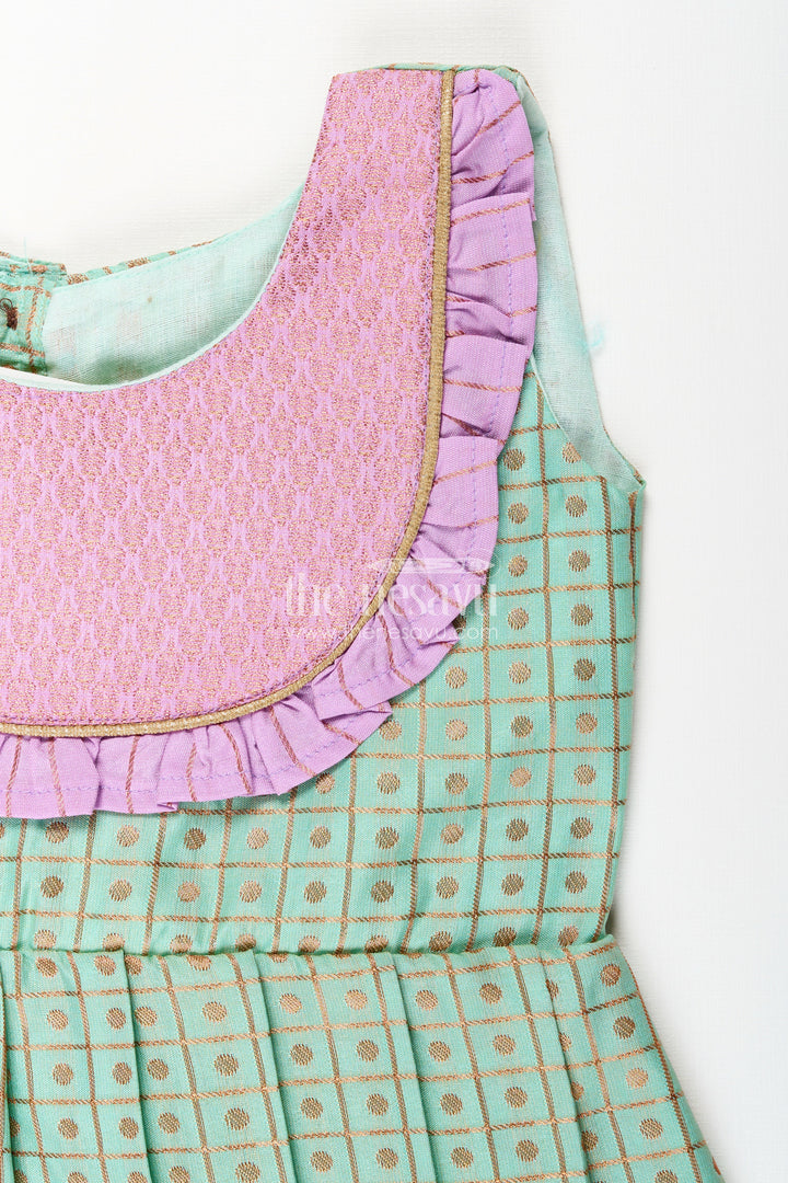 The Nesavu Girls Kanchi Silk Frock Girls Green Semi Kanchivaram Silk Frock with Lavender Border Nesavu Nesavu girls green semi Kanchivaram silk frock with lavender border and frill yoke