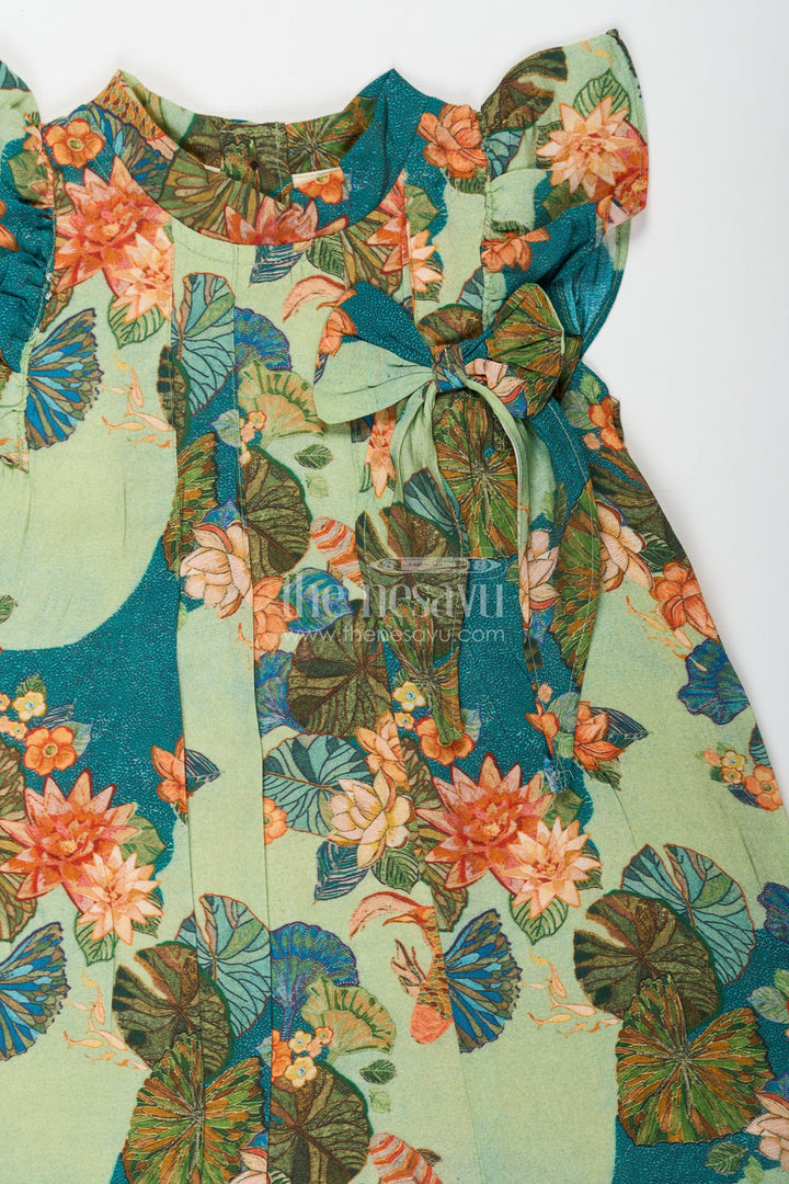 The Nesavu Girls Chanderi Frock Girls Green Viscose Silk Frock with Vibrant Floral Print Perfect for Party Dress Design for Toddlers and Kids Nesavu Girls Green Viscose Silk Frock Colorful Floral Print Party Dress Design Perfect Special Occasions | The Nesavu