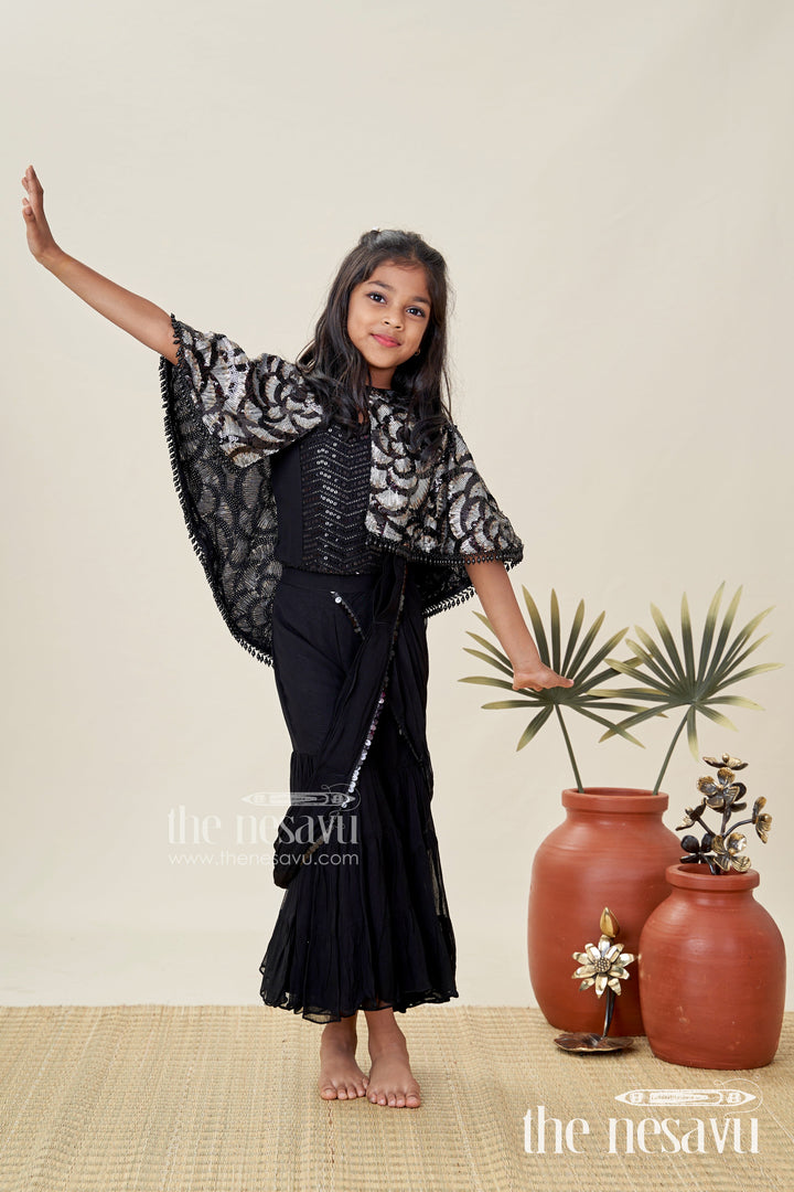 The Nesavu Girls Sharara / Plazo Set Girls Indo Western Sharara Set with Sequin Cape and Crop Top Nesavu 24 (5Y) / Black GPS729A-24 Nesavu Black Cape Style Sharara Set Girls Sequin Crop Top Flared Pants