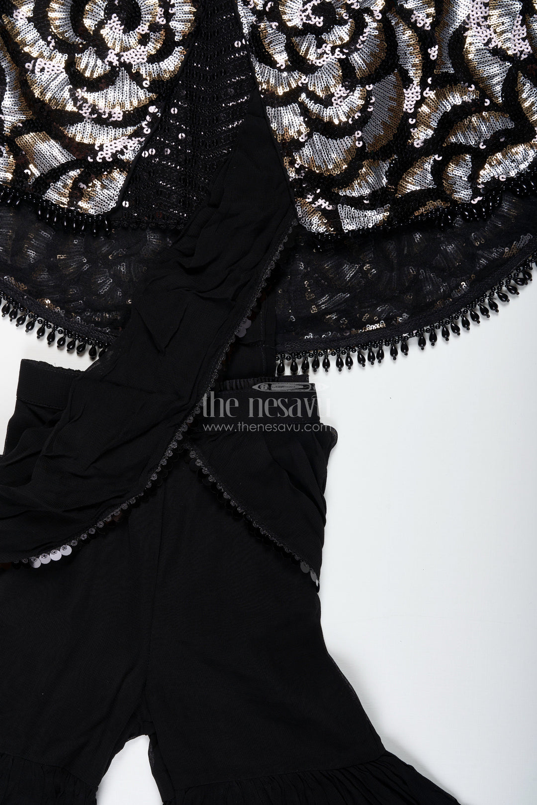 The Nesavu Girls Sharara / Plazo Set Girls Indo Western Sharara Set with Sequin Cape and Crop Top Nesavu Nesavu Black Cape Style Sharara Set Girls Sequin Crop Top Flared Pants