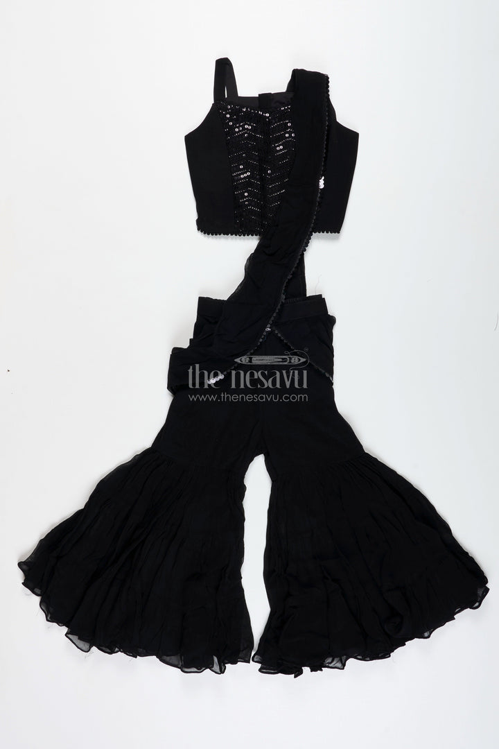 The Nesavu Girls Sharara / Plazo Set Girls Indo Western Sharara Set with Sequin Cape and Crop Top Nesavu Nesavu Black Cape Style Sharara Set Girls Sequin Crop Top Flared Pants