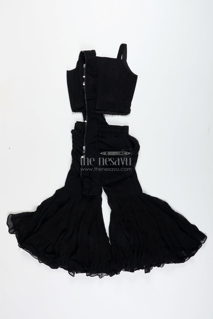 The Nesavu Girls Sharara / Plazo Set Girls Indo Western Sharara Set with Sequin Cape and Crop Top Nesavu Nesavu Black Cape Style Sharara Set Girls Sequin Crop Top Flared Pants