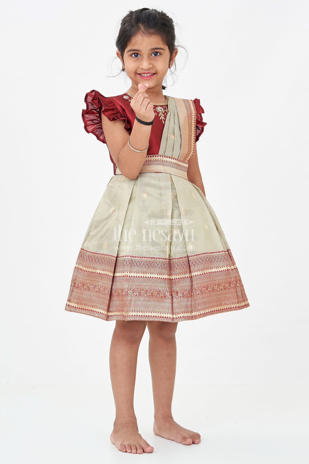The Nesavu Silk Party Frock Girls Infant Baptism Dress in Maroon and Gold with Pleated Silk Skirt and Puff Sleeves for Graceful Looks Nesavu 16 (1Y) / Maroon SF955E-16 Girls Silk Infant Baptism Dress Zari Border Puff Sleeves Maroon Gold | The Nesavu