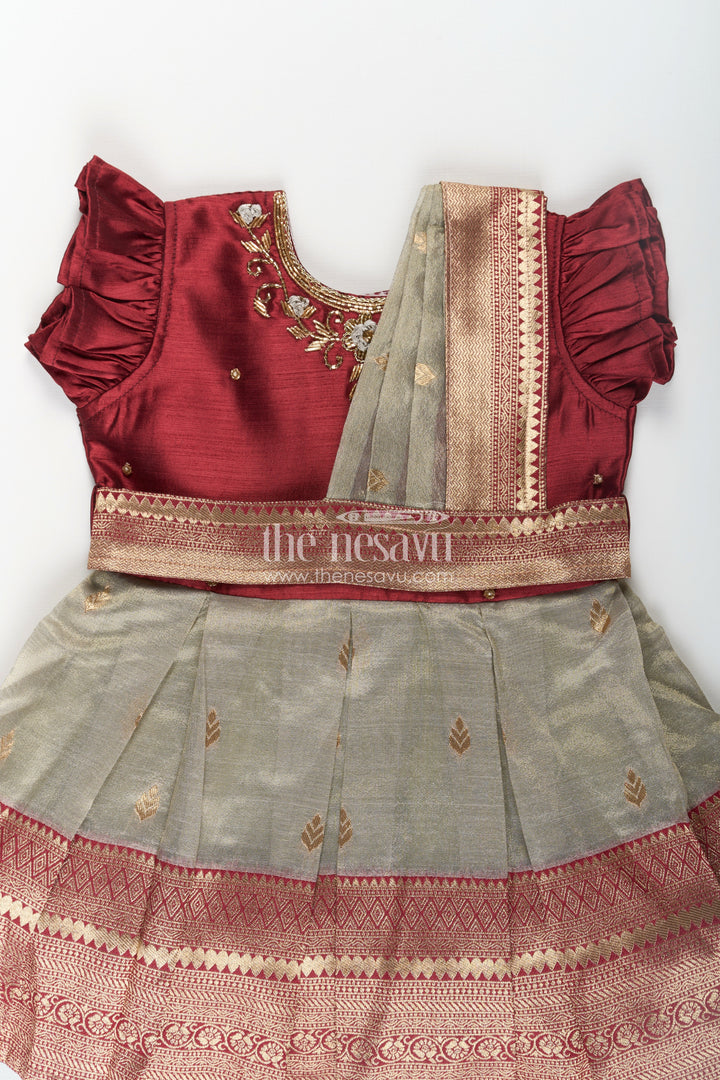 The Nesavu Silk Party Frock Girls Infant Baptism Dress in Maroon and Gold with Pleated Silk Skirt and Puff Sleeves for Graceful Looks Nesavu Girls Silk Infant Baptism Dress Zari Border Puff Sleeves Maroon Gold | The Nesavu