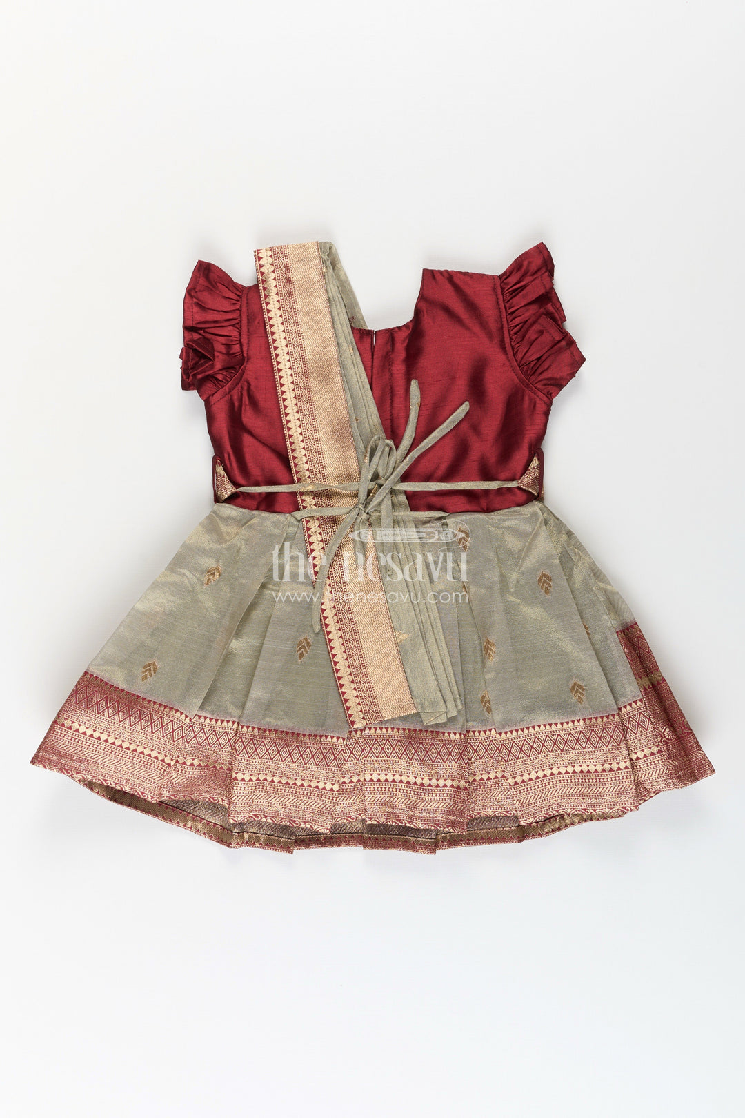 The Nesavu Silk Party Frock Girls Infant Baptism Dress in Maroon and Gold with Pleated Silk Skirt and Puff Sleeves for Graceful Looks Nesavu Girls Silk Infant Baptism Dress Zari Border Puff Sleeves Maroon Gold | The Nesavu