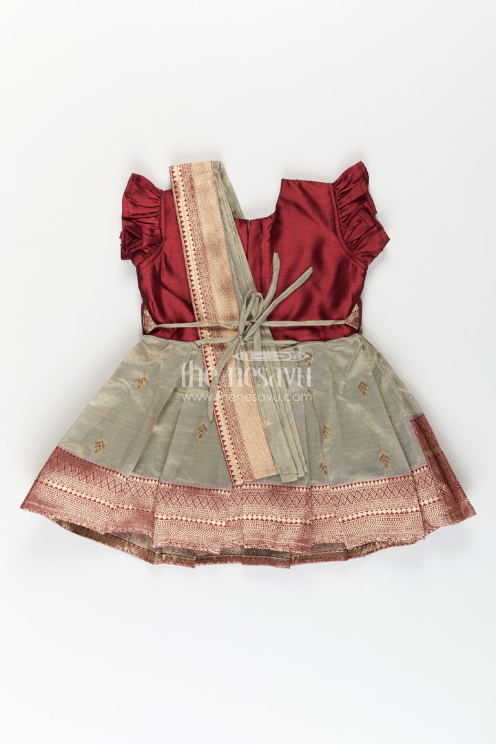 The Nesavu Silk Party Frock Girls Infant Baptism Dress in Maroon and Gold with Pleated Silk Skirt and Puff Sleeves for Graceful Looks Nesavu Girls Silk Infant Baptism Dress Zari Border Puff Sleeves Maroon Gold | The Nesavu