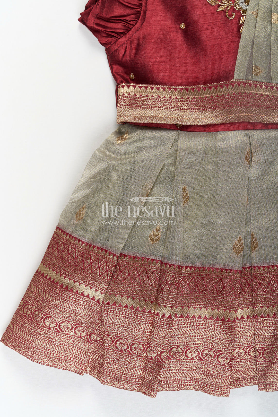 The Nesavu Silk Party Frock Girls Infant Baptism Dress in Maroon and Gold with Pleated Silk Skirt and Puff Sleeves for Graceful Looks Nesavu Girls Silk Infant Baptism Dress Zari Border Puff Sleeves Maroon Gold | The Nesavu