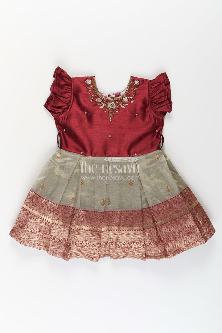 The Nesavu Silk Party Frock Girls Infant Baptism Dress in Maroon and Gold with Pleated Silk Skirt and Puff Sleeves for Graceful Looks Nesavu Girls Silk Infant Baptism Dress Zari Border Puff Sleeves Maroon Gold | The Nesavu