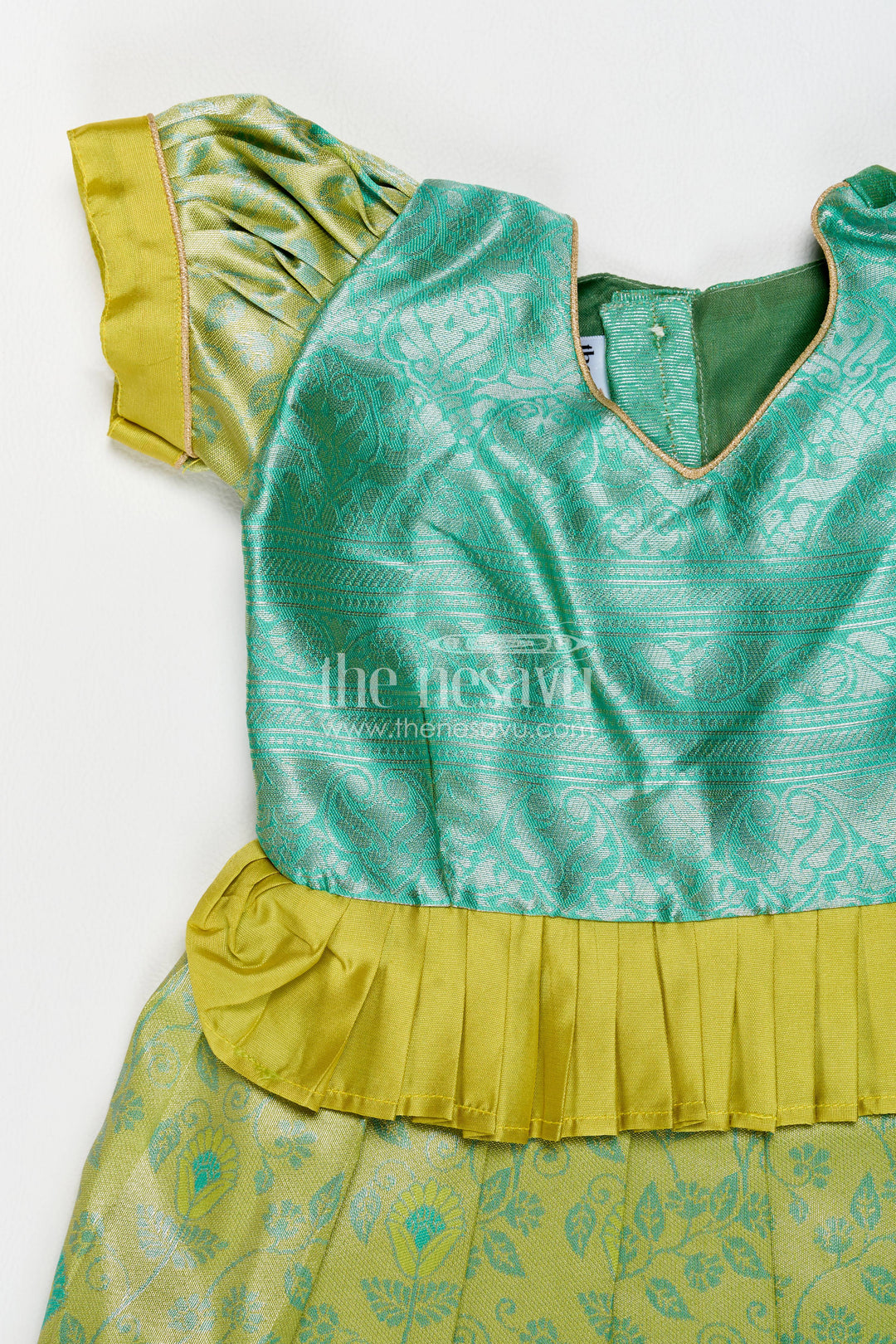 The Nesavu Girls Kanchi Silk Frock Girls Kanchi Silk Frock in Turquoise for Party Memories Nesavu Nesavu Girls Kanchi Silk Frock In Turquoise For Parties And Memorable