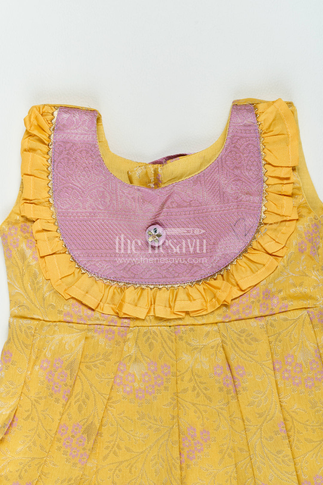 The Nesavu Girls Kanchi Silk Frock Girls Kanchi Silk Frock in Yellow with Smart Tailoring Nesavu Nesavu Girls Kanchi Silk Frock In Yellow For Parties And Memorable