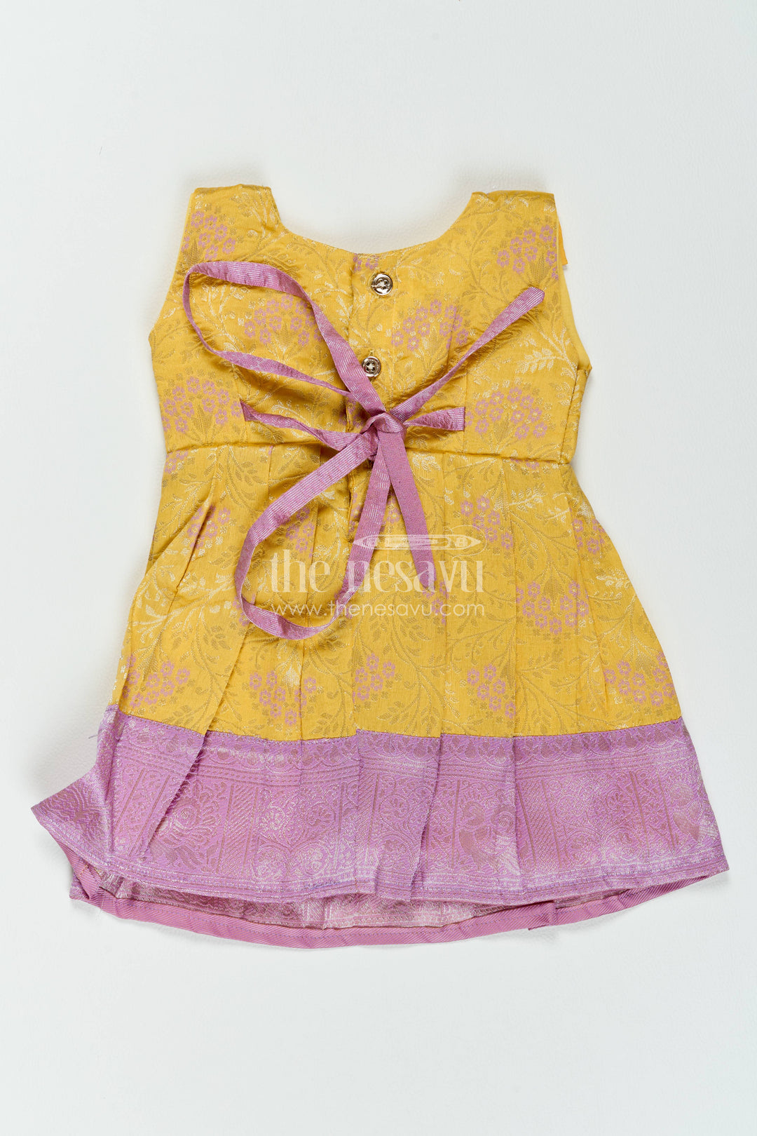 The Nesavu Girls Kanchi Silk Frock Girls Kanchi Silk Frock in Yellow with Smart Tailoring Nesavu Nesavu Girls Kanchi Silk Frock In Yellow For Parties And Memorable