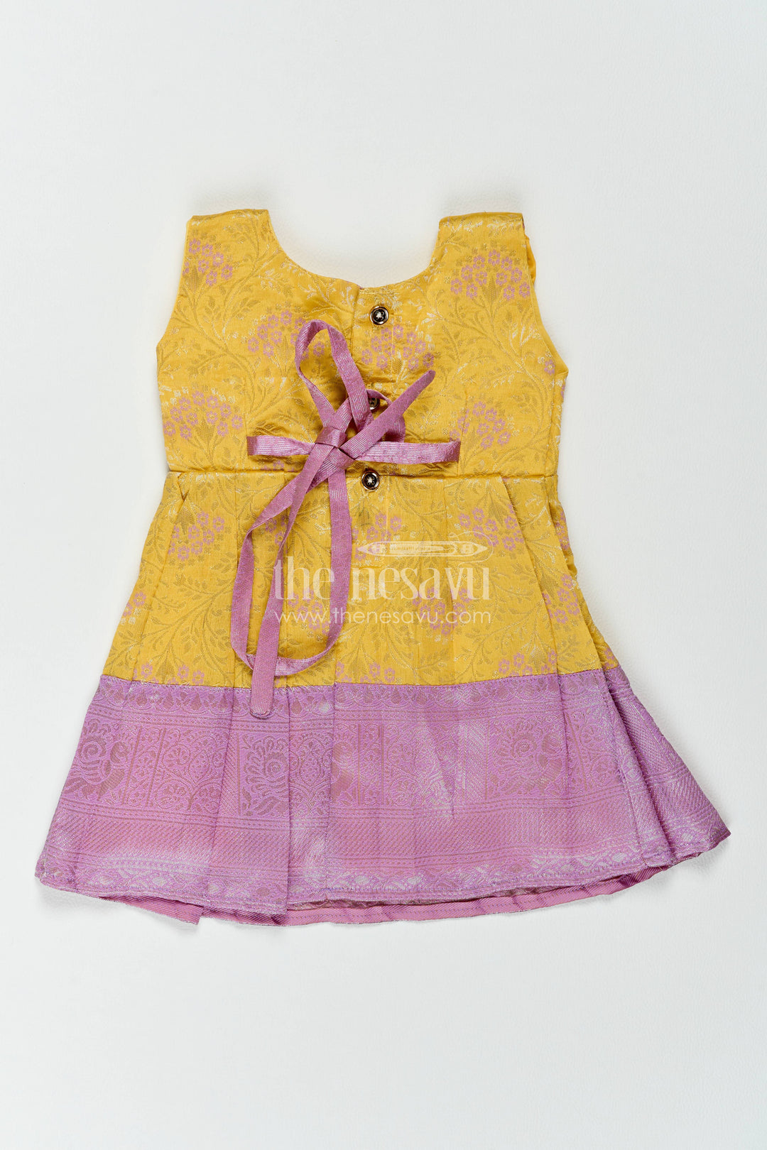 The Nesavu Girls Kanchi Silk Frock Girls Kanchi Silk Frock in Yellow with Smart Tailoring Nesavu Nesavu Girls Kanchi Silk Frock In Yellow For Parties And Memorable