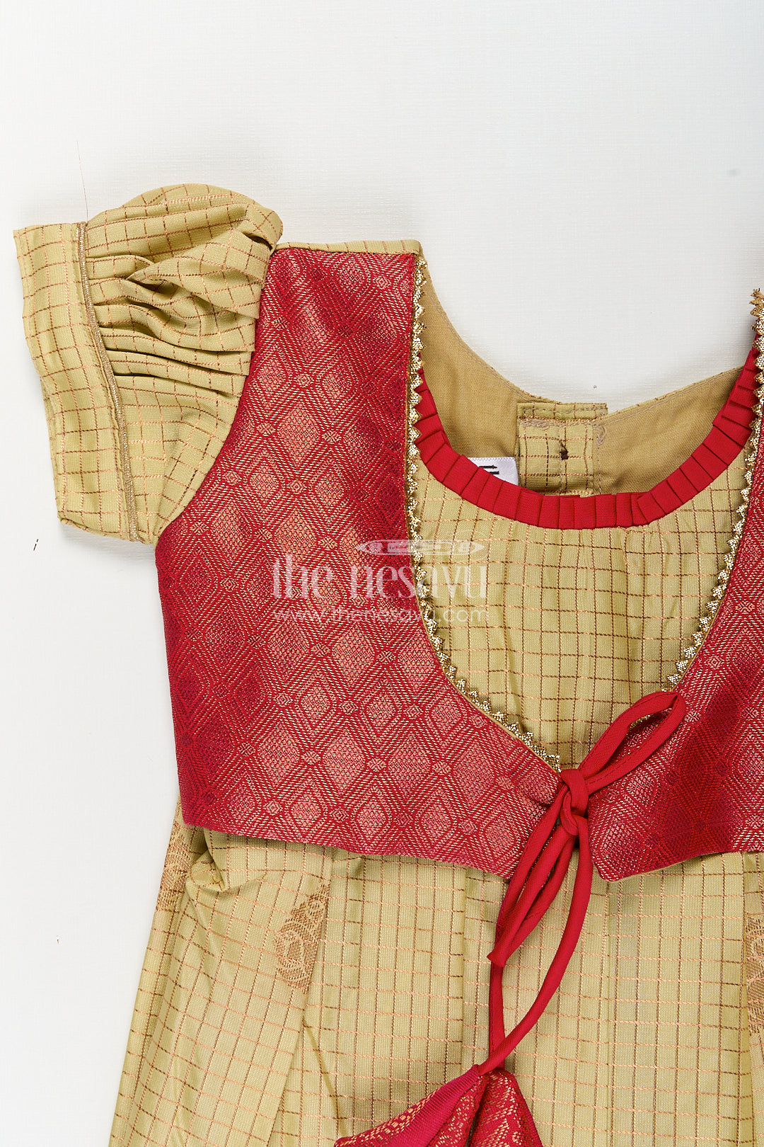 The Nesavu Girls Kanchi Silk Frock Girls Kanchivaram Cream Colour Frocks with Puff Sleeves and Rich Red Zari Border for Elegant Ethnic Appeal Nesavu Nesavu Girls Cream Colour Frocks Kanchivaram Silk Red Zari Border Puff Sleeve Overlay