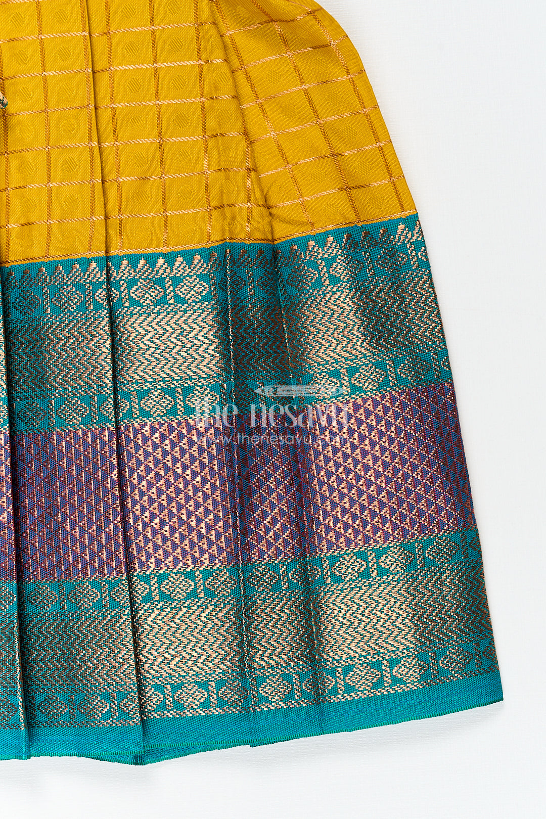 The Nesavu Girls Kanchi Silk Frock Girls Kanchivaram Ethnic Frocks in Mustard Yellow with Green Zari Overlay and Traditional Border Accents Nesavu Nesavu Girls Ethnic Frocks Mustard Green Kanchivaram Silk Zari Border Puff Sleeves