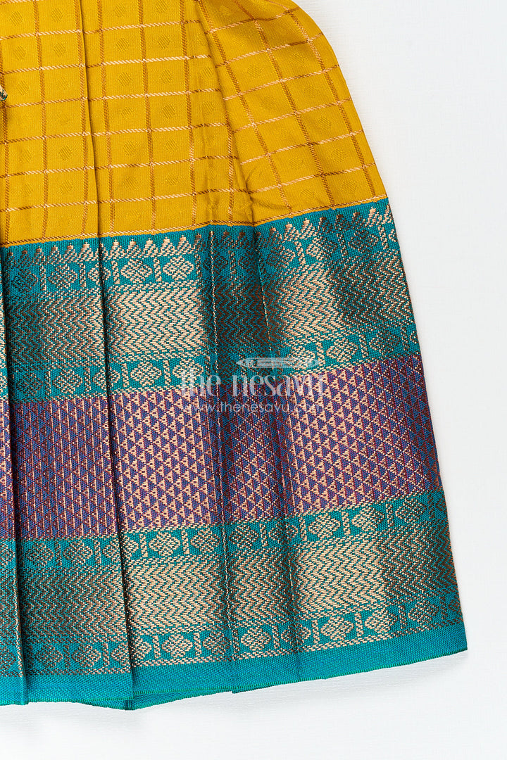 The Nesavu Girls Kanchi Silk Frock Girls Kanchivaram Ethnic Frocks in Mustard Yellow with Green Zari Overlay and Traditional Border Accents Nesavu Nesavu Girls Ethnic Frocks Mustard Green Kanchivaram Silk Zari Border Puff Sleeves