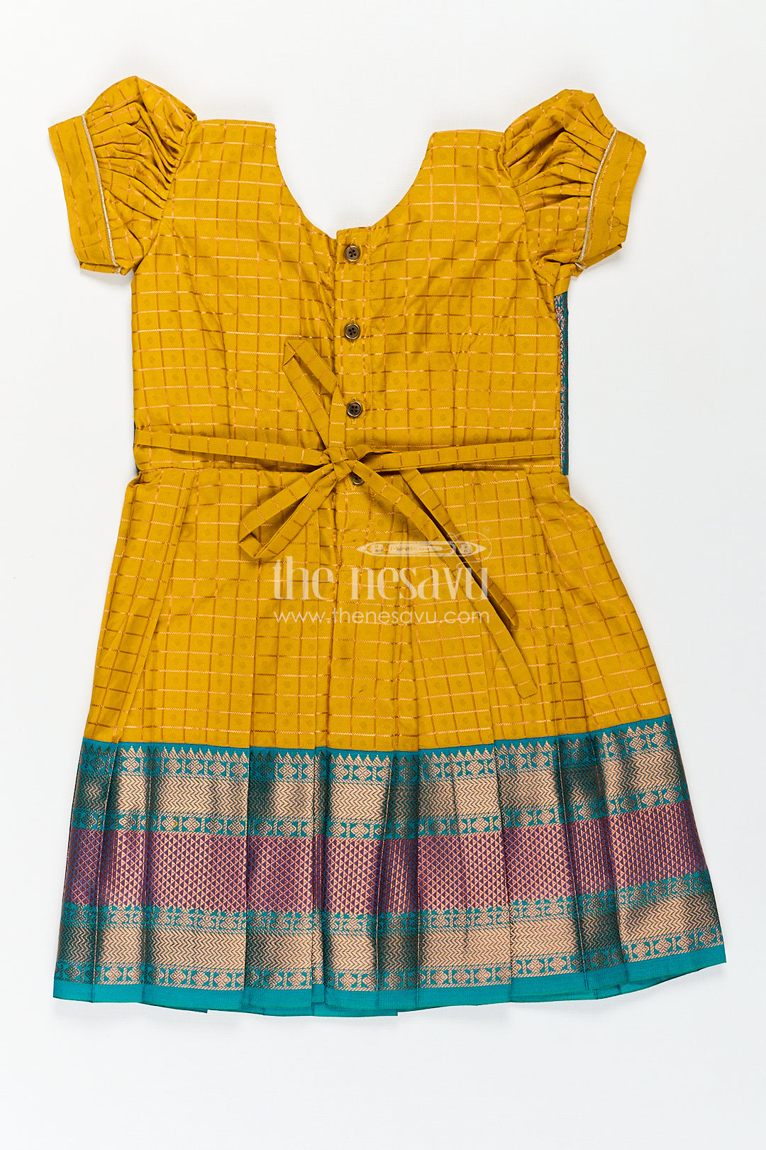 The Nesavu Girls Kanchi Silk Frock Girls Kanchivaram Ethnic Frocks in Mustard Yellow with Green Zari Overlay and Traditional Border Accents Nesavu Nesavu Girls Ethnic Frocks Mustard Green Kanchivaram Silk Zari Border Puff Sleeves
