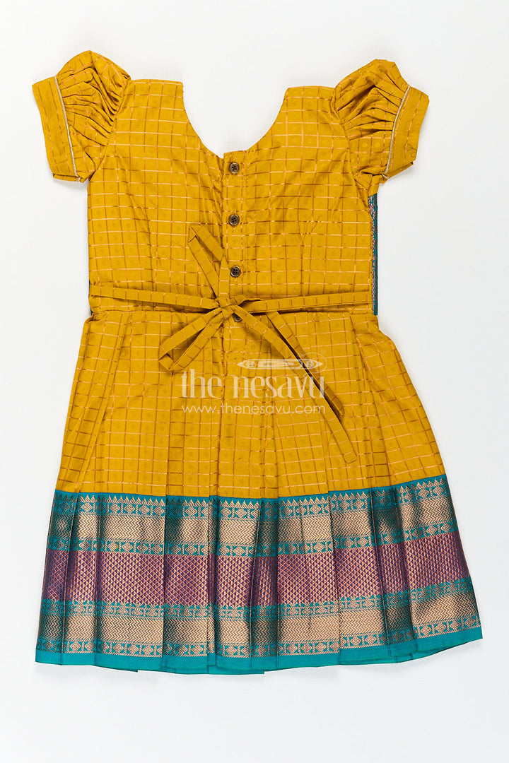 The Nesavu Girls Kanchi Silk Frock Girls Kanchivaram Ethnic Frocks in Mustard Yellow with Green Zari Overlay and Traditional Border Accents Nesavu Nesavu Girls Ethnic Frocks Mustard Green Kanchivaram Silk Zari Border Puff Sleeves