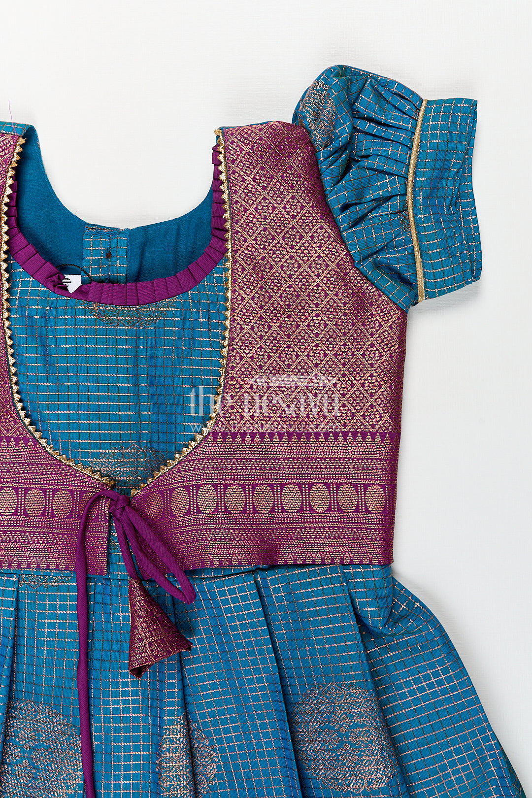 The Nesavu Girls Kanchi Silk Frock Girls Kanchivaram Frock Silk Design in Blue and Purple with Puff Sleeves and Rich Zari Woven Patterns Nesavu Nesavu Girls Frock Silk Design Blue Purple Kanchivaram Silk Puff Sleeves Zari Details