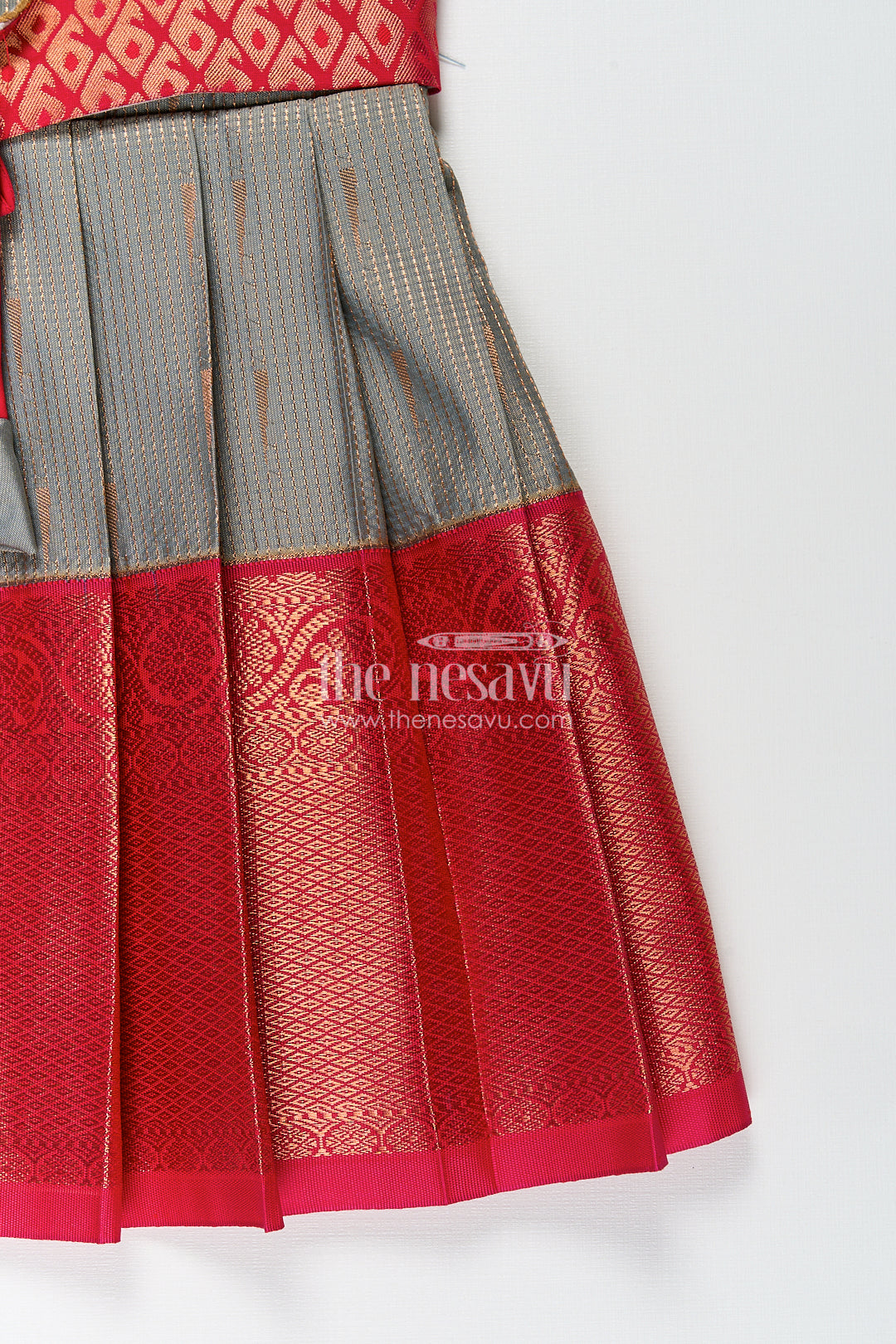 The Nesavu Girls Kanchi Silk Frock Girls Kanchivaram Long Pattu Frock with Puff Sleeves in Grey Silk and Rich Red Zari Border Finish Nesavu Nesavu Girls Long Pattu Frock Grey Kanchivaram Silk Red Zari Overlay Traditional Pleated Design