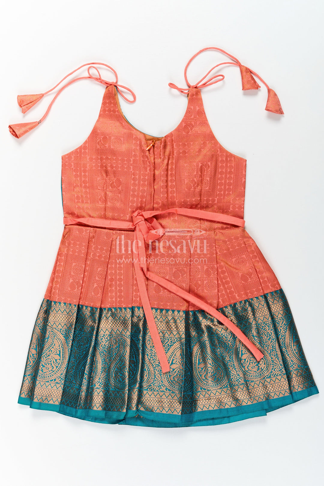 The Nesavu Tie-up Frock Girls Kanchivaram Silk Tie Up Frock in Orange and Teal with Traditional Zari Weave and Shoulder Tassels Nesavu Kanchivaram Silk Tie Up Frock for Girls in Orange and Teal with Traditional Zari Design | The Nesavu