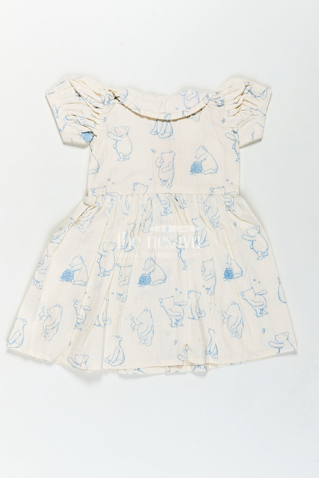 The Nesavu Girls Cotton Frock Girls Latest Cotton Dress in White with Allover Digital Animal Print and Classic Peter Pan Collar Nesavu Girls Latest Cotton Dress Animal Print Peter Pan Collar Soft White Cotton Fabric | The Nesavu