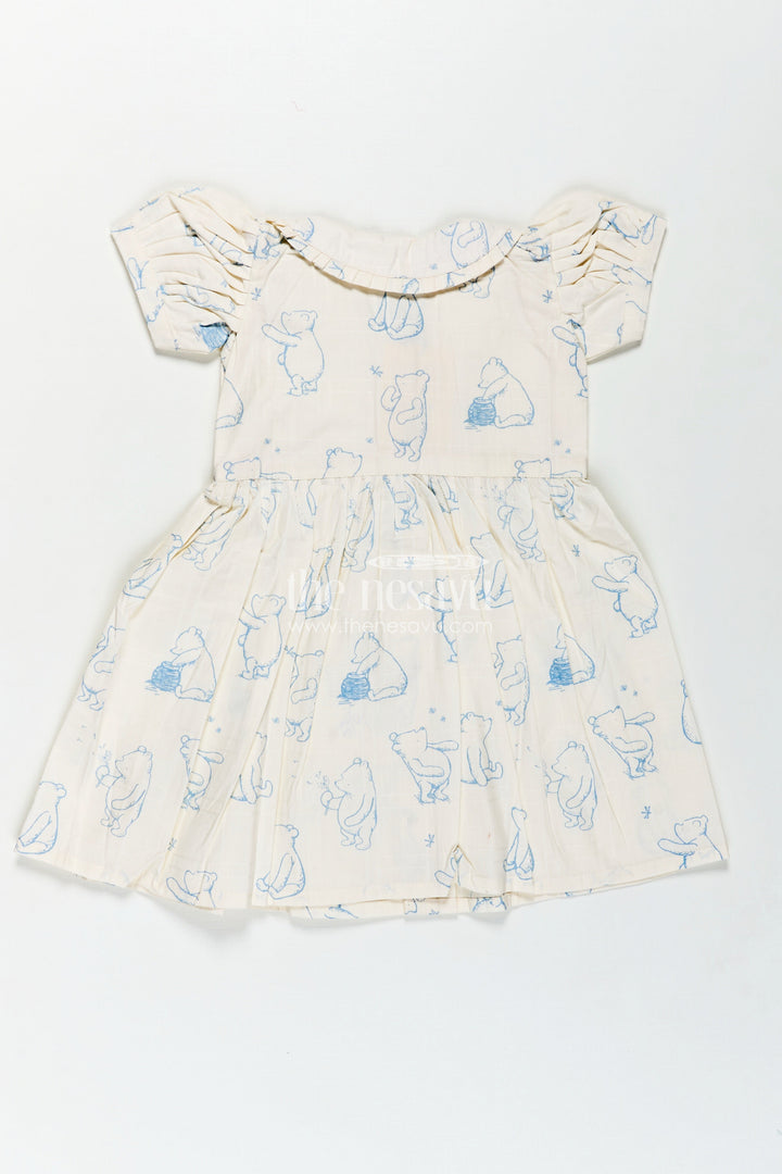 The Nesavu Girls Cotton Frock Girls Latest Cotton Dress in White with Allover Digital Animal Print and Classic Peter Pan Collar Nesavu Girls Latest Cotton Dress Animal Print Peter Pan Collar Soft White Cotton Fabric | The Nesavu