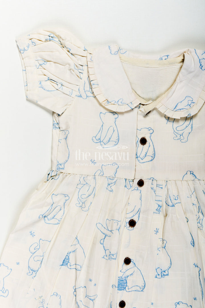 The Nesavu Girls Cotton Frock Girls Latest Cotton Dress in White with Allover Digital Animal Print and Classic Peter Pan Collar Nesavu Girls Latest Cotton Dress Animal Print Peter Pan Collar Soft White Cotton Fabric | The Nesavu