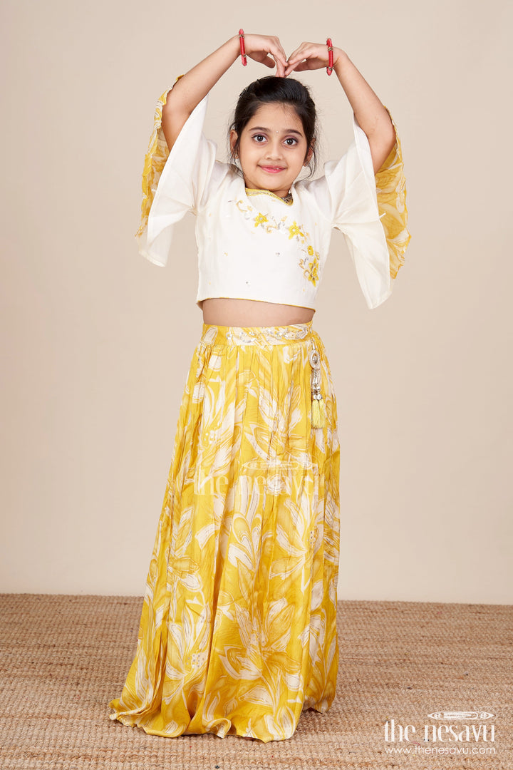 The Nesavu Girls Lehenga Choli Girls Lehenga Choli Set with Floral Print and Flutter Sleeves Nesavu 28 (7Y) / Yellow GL816A-28 Nesavu yellow floral lehenga choli set girls flutter sleeves  festive haldi outfit