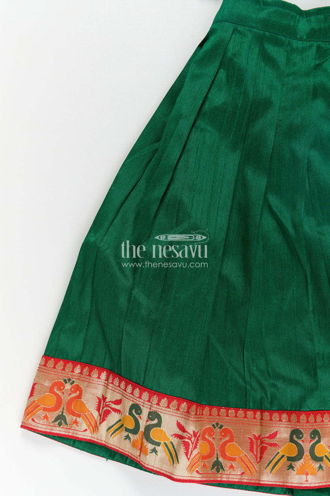 The Nesavu Pattu Pavadai Girls Lehengha Pattu in Green Raw Silk with Paithani Border and Embellished Yoke Nesavu Girls Lehengha Pattu Green Raw Silk Embroidered Paithani Border Sleeveless Top | The Nesavu